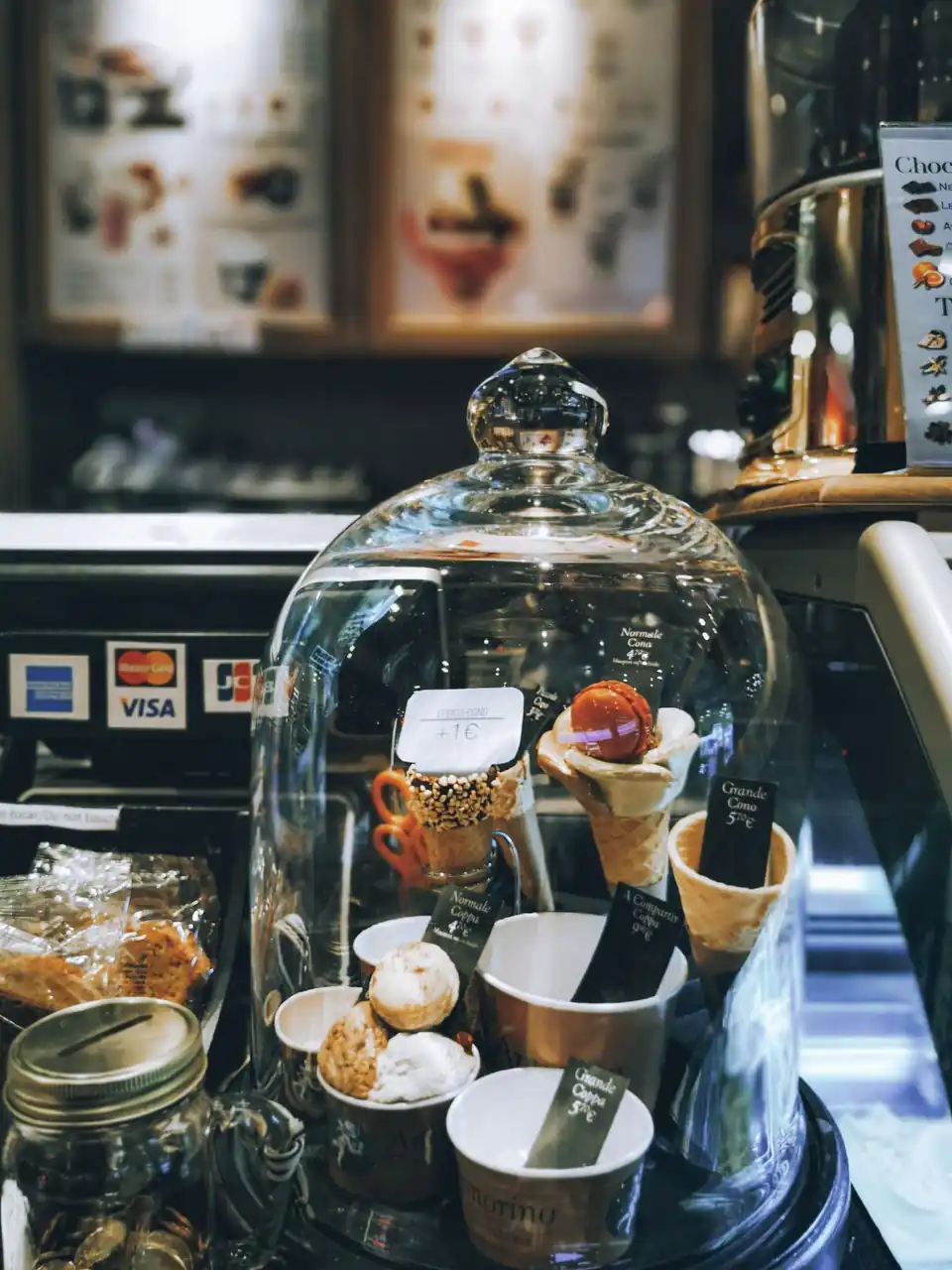 Pastries and ice cream under glass dome